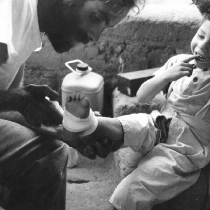 Wrapping the foot of an injured boy